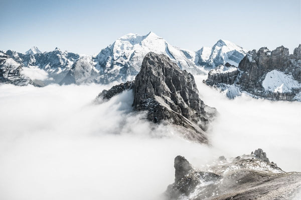 mountains rising out of mist